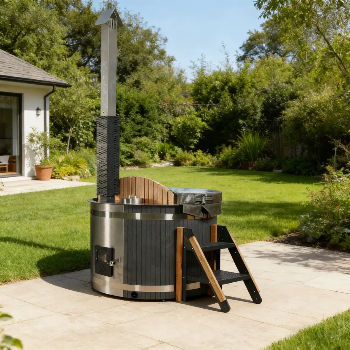Bain nordique Senja rond compact, composite anthracite et cuve inox, poêle intégré